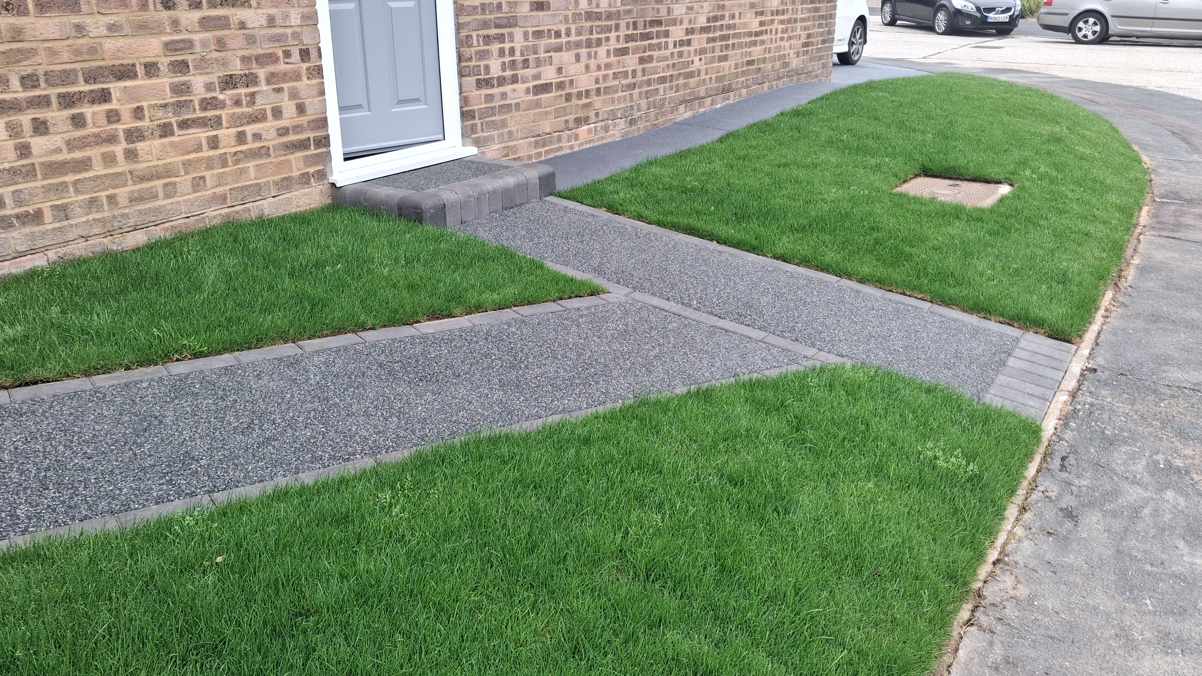 Transformed outside area with lush, healthy new lawn in Littlehampton