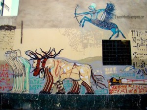 [Alaa Awad continues his pharaonic art with a replica of a pharaonic tomb’s mural. The artist draws most of his inspiration from the pharaonic art of Luxor, where he normally resides.]