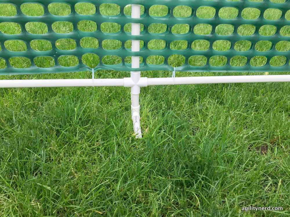Cable ties along bottom of gate Cable ties along bottom of gate