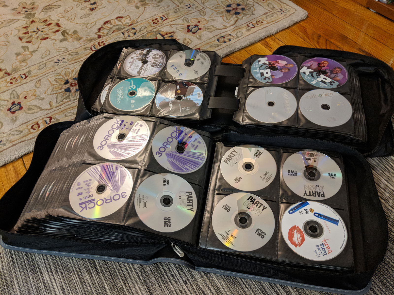 Photo of two 500-disc binders of DVDs and Blu-Rays