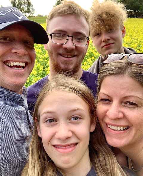 A group selfie photo of my family.