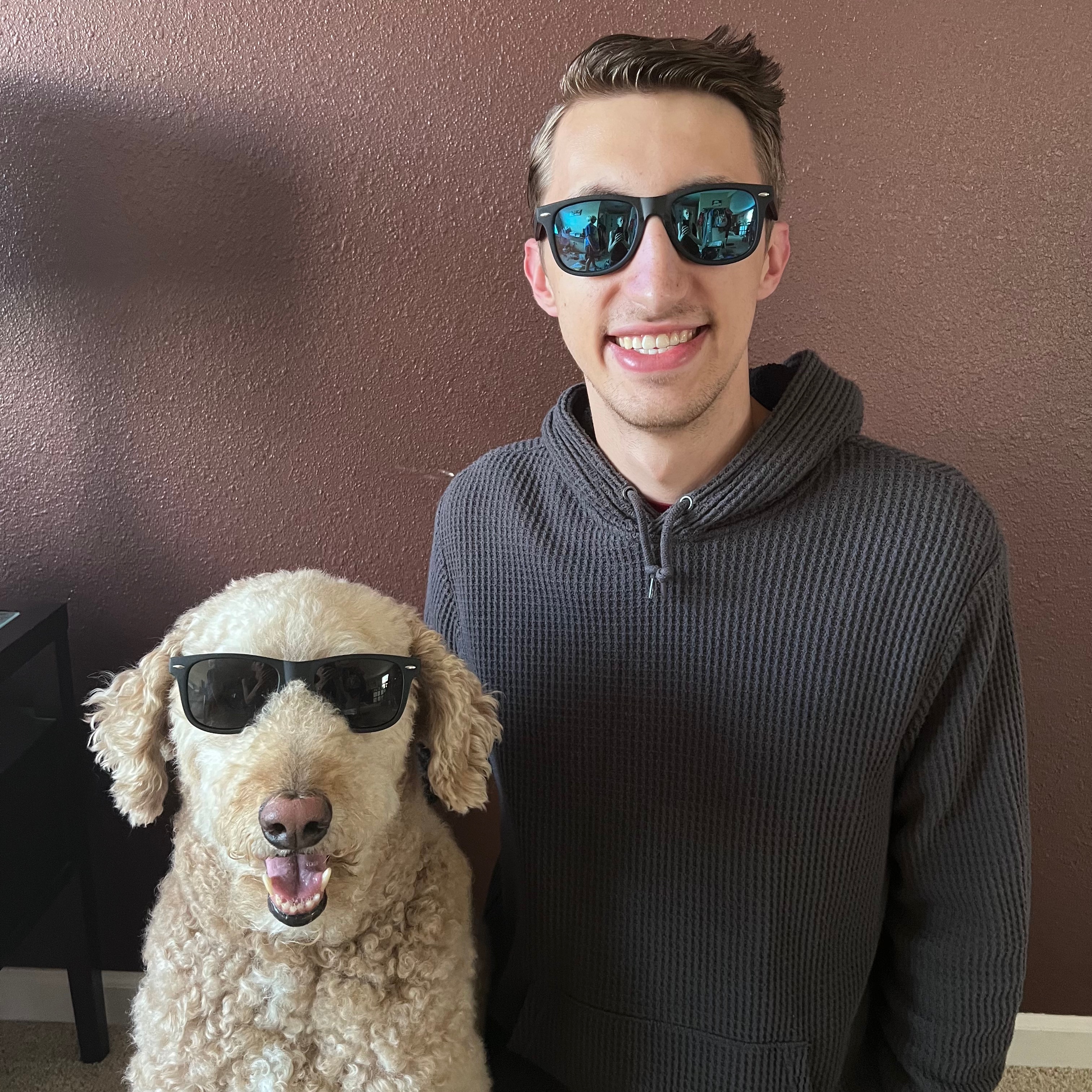 Real-life photo of my and my dog wearing sunglasses