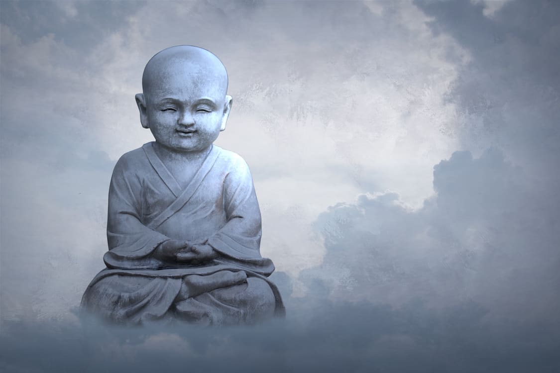 Buddhist child meditating