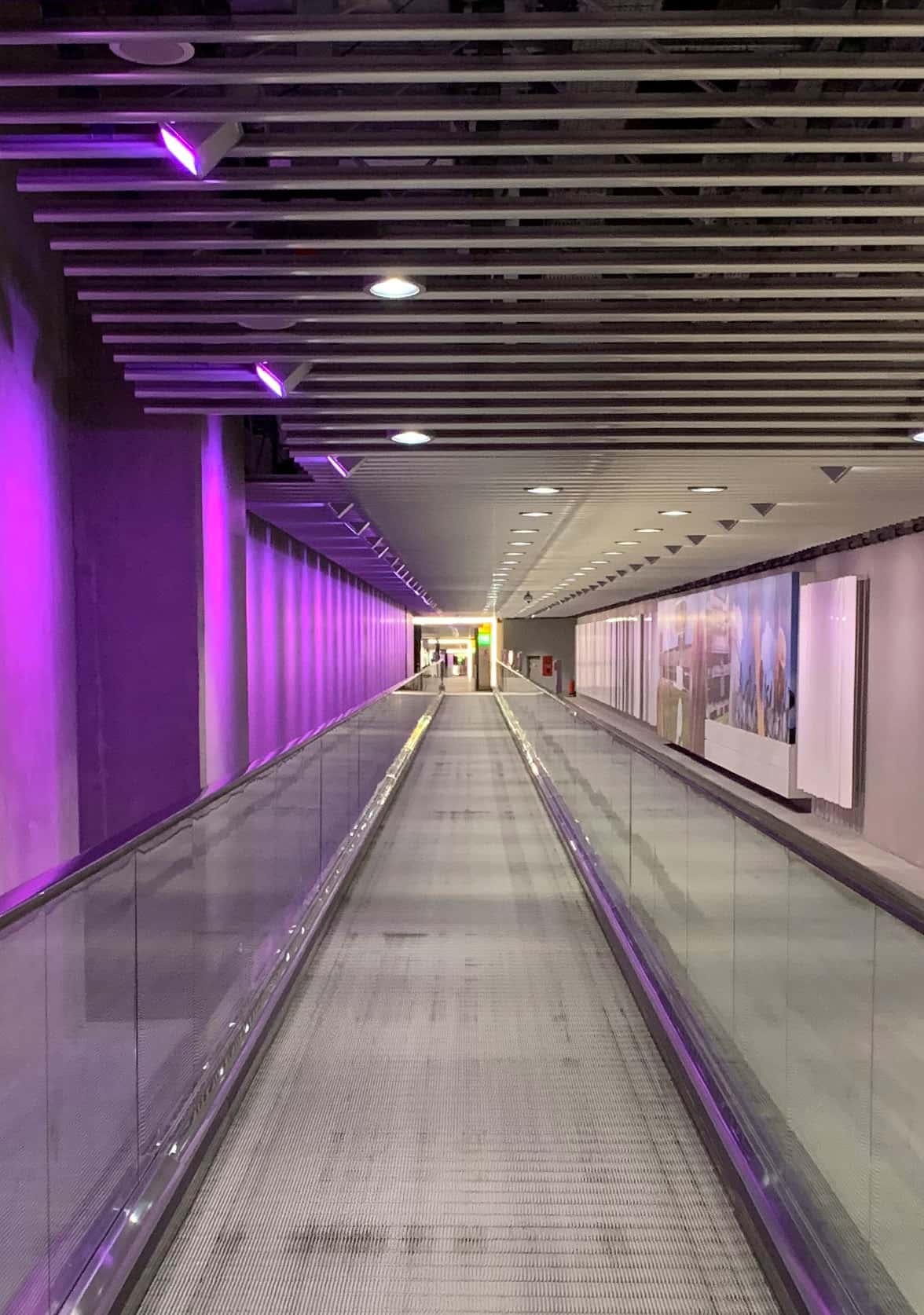 Photo of a travelator in a long, empty corridor at Heathrow