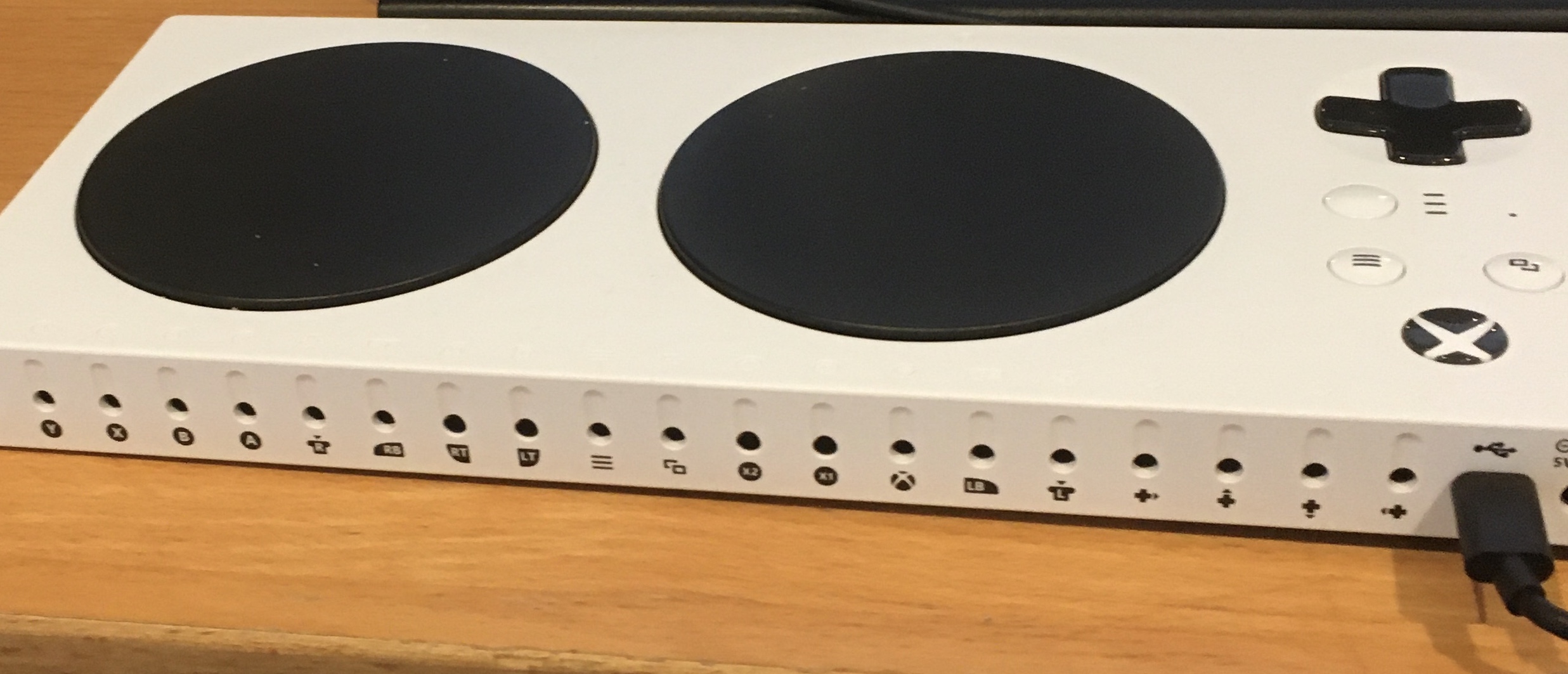 Back of Sam Graves' Xbox Adaptive Controller. There are about 20 ports for plugging in external devices.