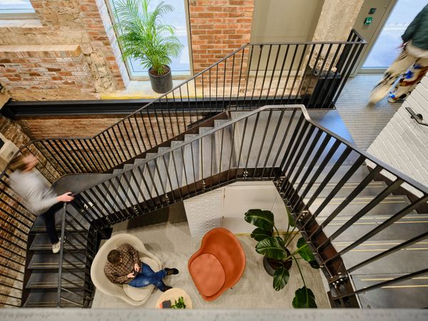 Hawkins Brown-Calico building at 53-55 Mosley Street in Manchester-Interior staircase aerial view