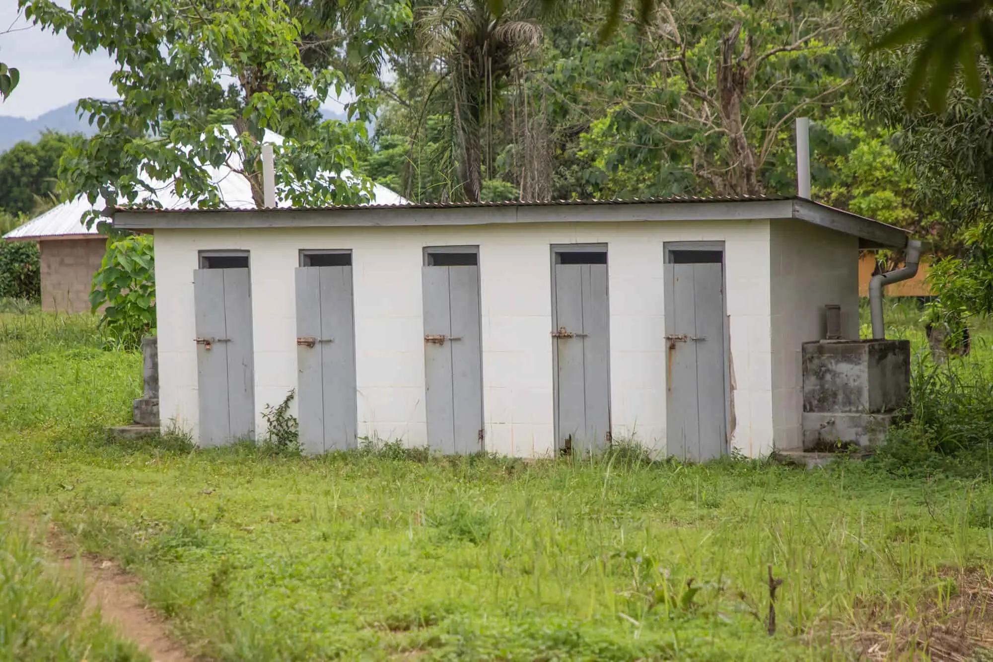 Girls' toilets of Benevolent Islamic PRI School in Yele Town, Sierra Leone, where Concern conducts Adolescent Sexual and Reproductive Health (ASRH) lessons