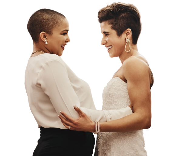 Lesbian couple dancing together at their wedding
