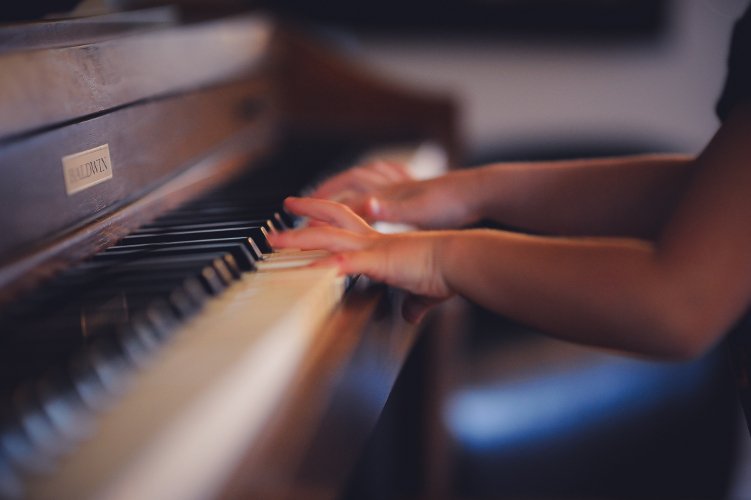 Student playing piano