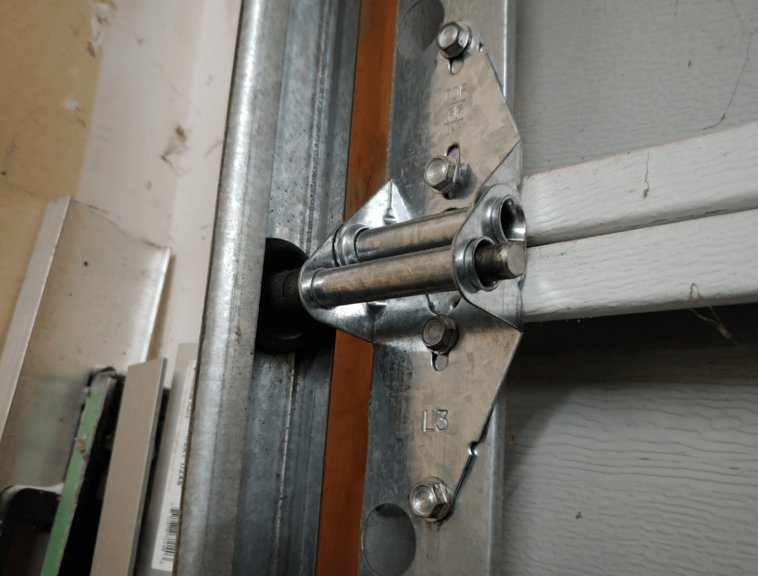 Garage Door Broken Hinge Repair, Portfolio 44