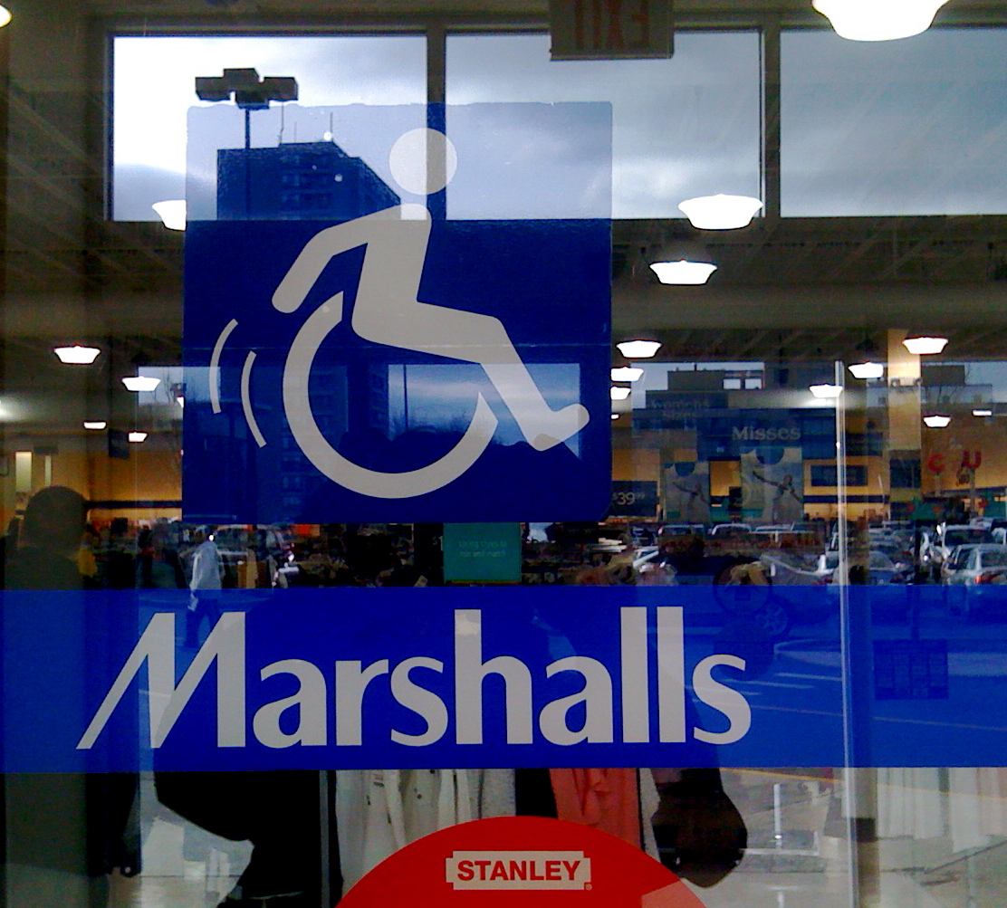 An accessibility icon at Marshalls in Cambridge, MA, showing a more dynamic, active figure, not unlike the one in our project.