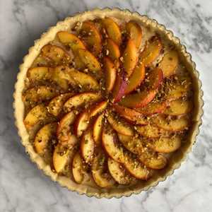 Peach and frangipane tart with pistachios
