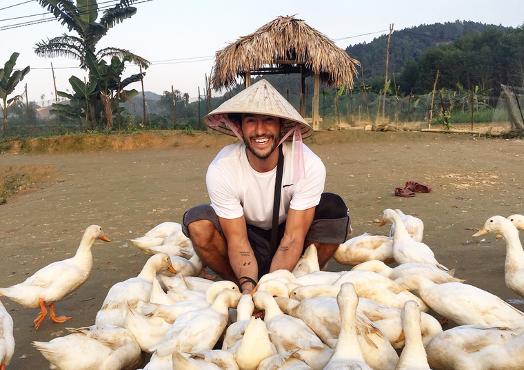 stevan with lots of ducks in Vietnam