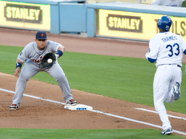 Miguel Cabrera of the Detroit Tigers catching a throw to first base.