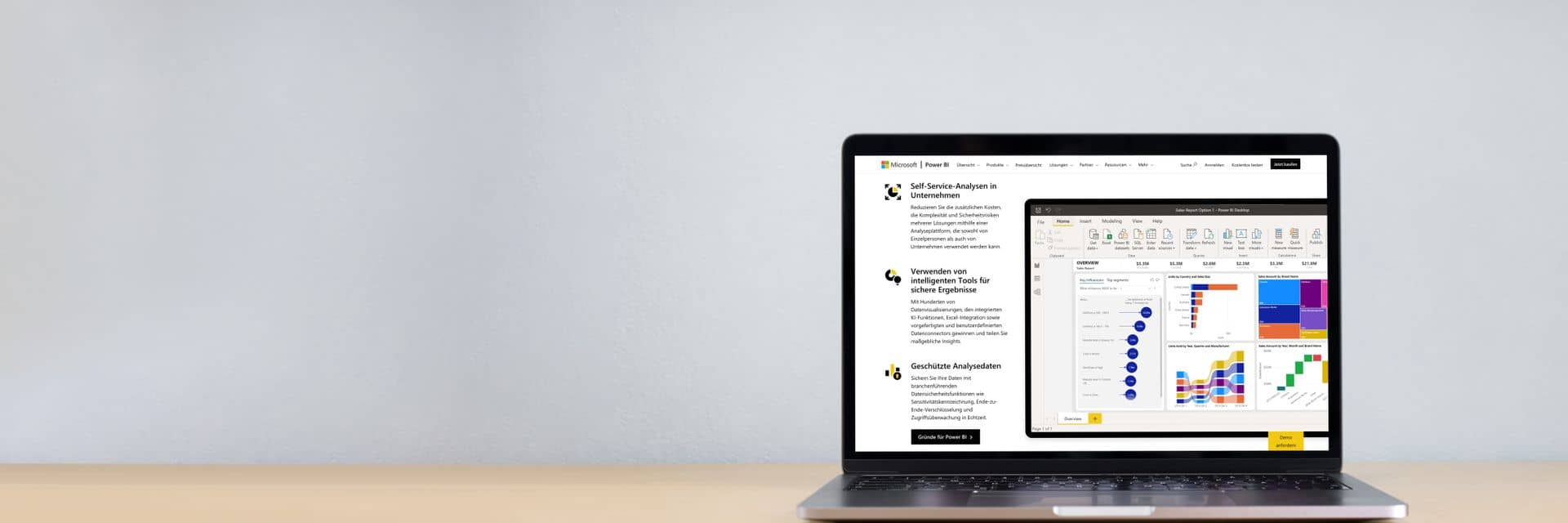 Laptop mit Power BI Laptop auf Schreibtisch mit Power BI auf Bildschirm