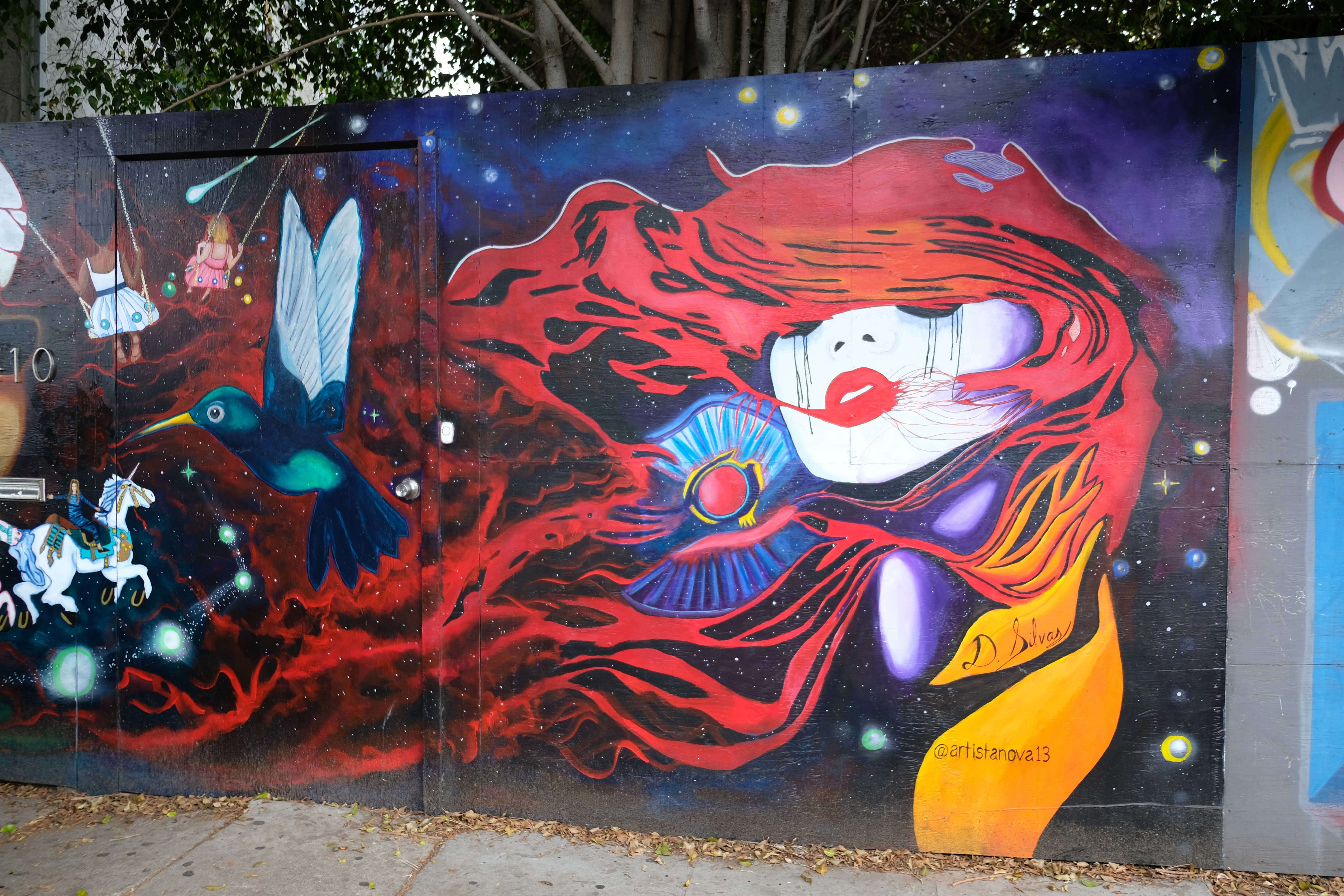 Daniel silvas mural of a woman with red hair