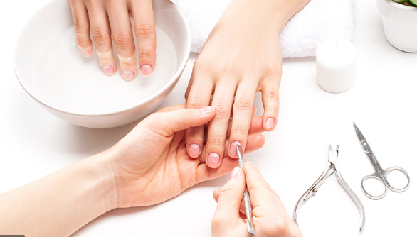 It's a nail care service that generally involves a professional filing, shaping, and painting the nails.