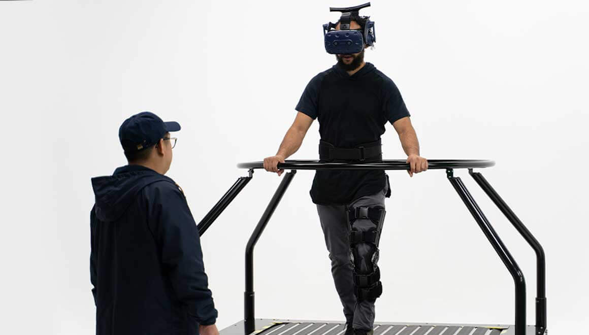 Image of Infinadeck team testing its omnidirectional VR treadmill.