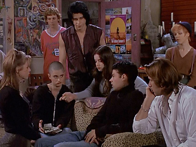 Joe, Lucas, and the rest of the staff at Empire Records setting up the Empire Records drinking game.