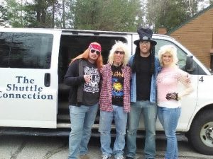 The band (Axl, Slash, Jem, Rick Allen) posing for The Shuttle Connection at Deer Park Resort
