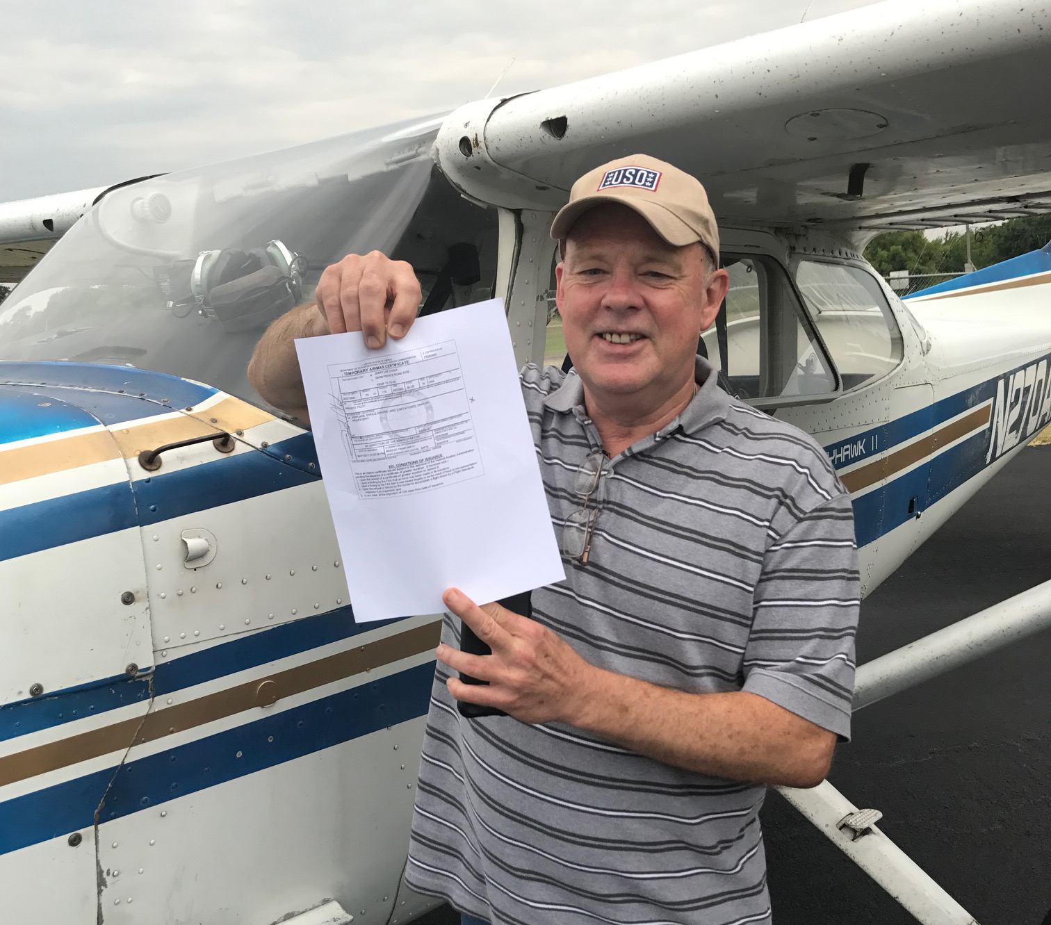 Photo of a Code 1 flight student earning their private pilot certificate