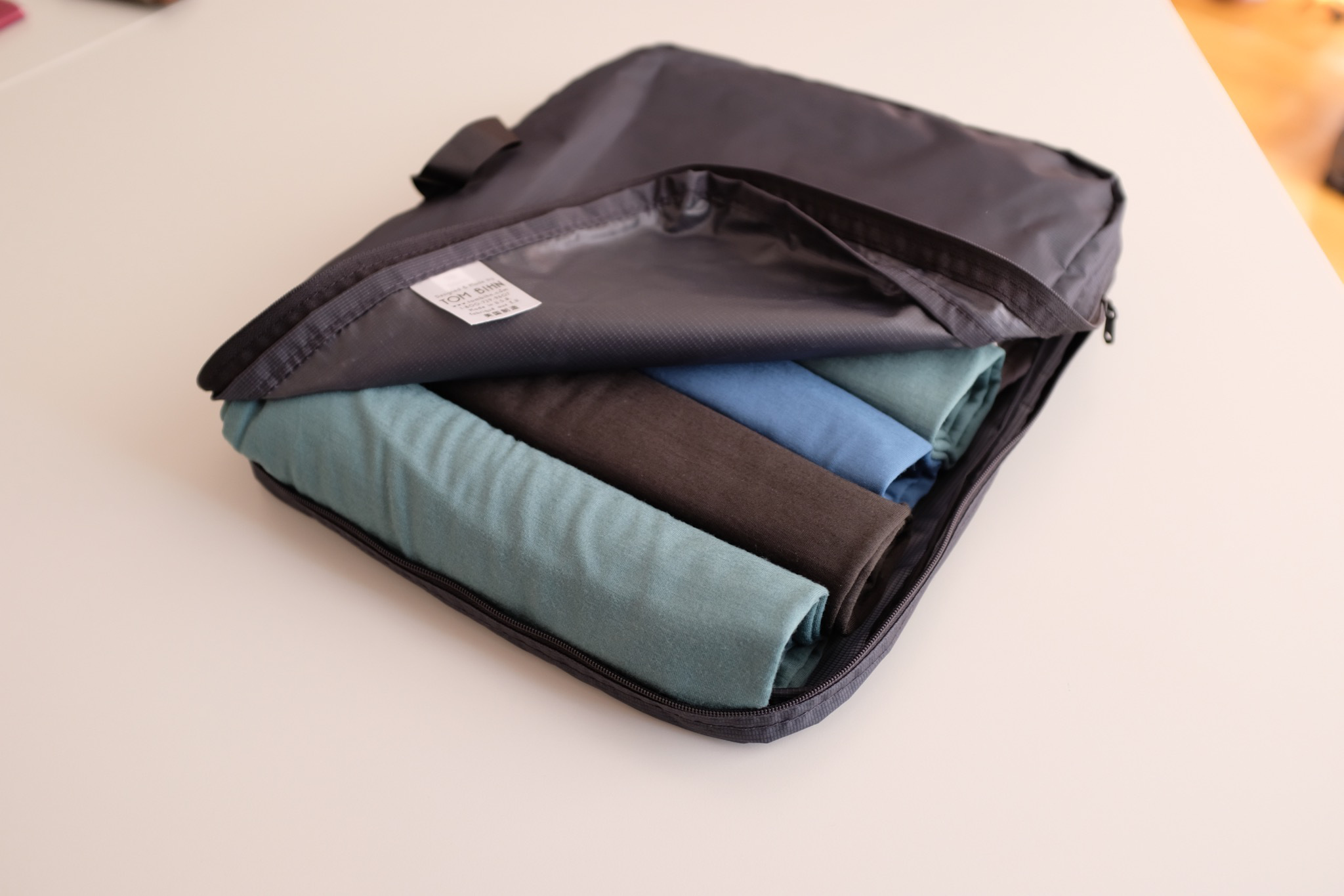 Custom made packing cube for the Tri-Star can hold multiple T-shirts