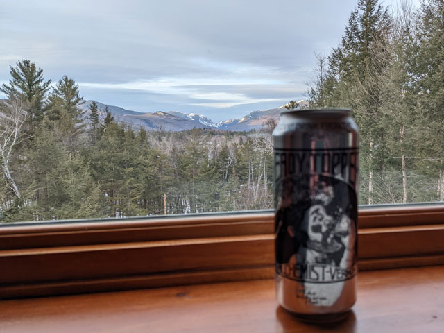 A can of Heady Topper on a windowsill overlooking Franconia Notch in New Hampshire