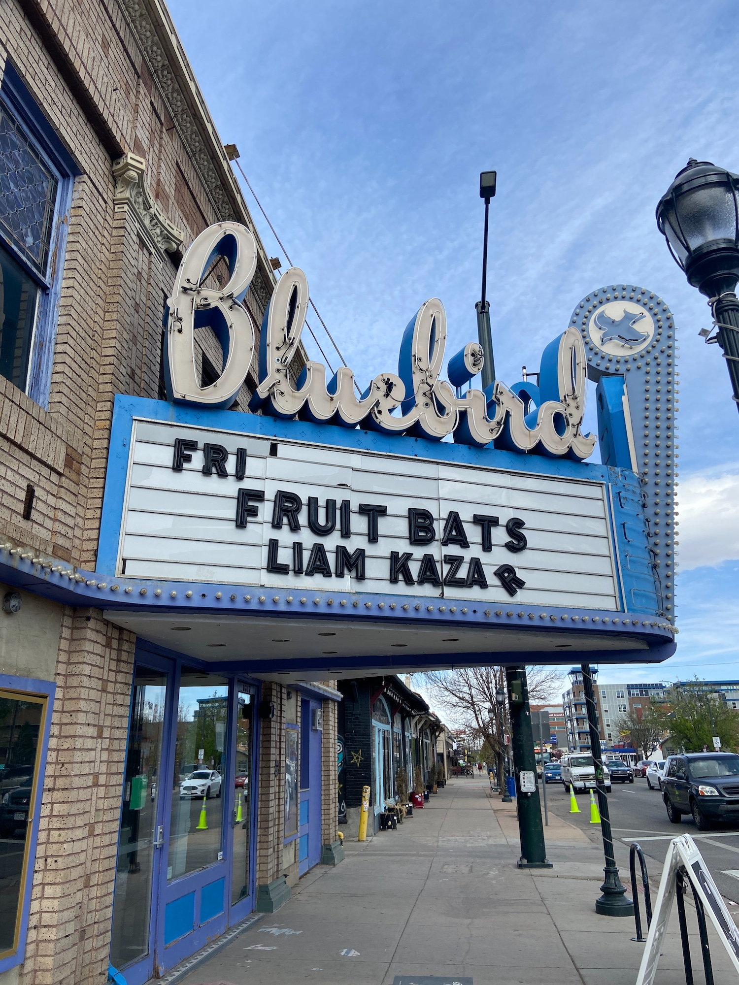 The marquee at the Bluebird Theater in Denver, Colorado, which reads Fri, Fruit Bats, Liam Kazar. The letter R in Liam Kazar is crooked.