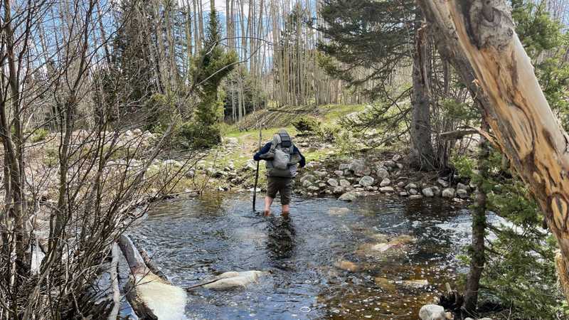 Sasquatch crosses a stream where he didn't see a bridge