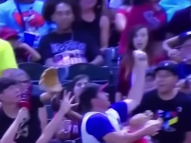Dad catches a fly ball while holding his beer and dropping his baby