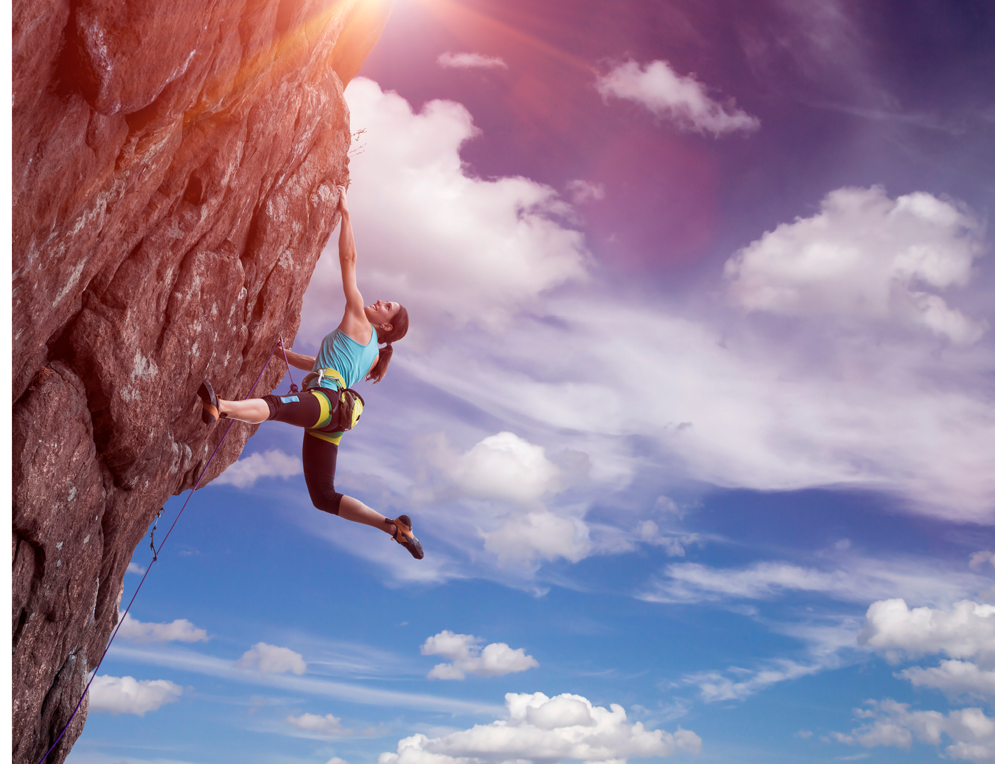 Climber hanging on her hand Climber hanging on her hand