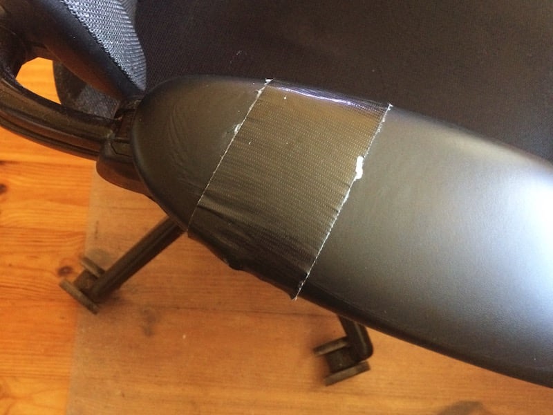Armrest repaired with Gorilla tape