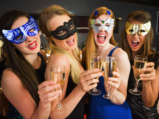 Four girls dressed up for a Masquerade Theme Party
