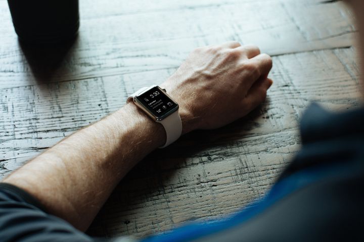 Man Looking At iWatch