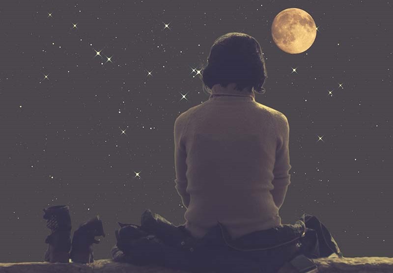 empath woman watching full moon