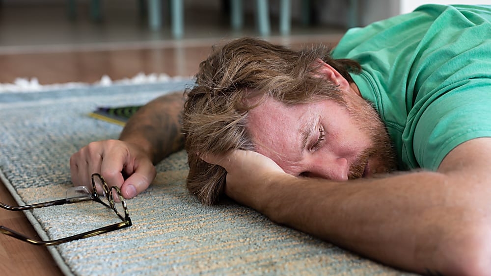 Man sleeping on the floor