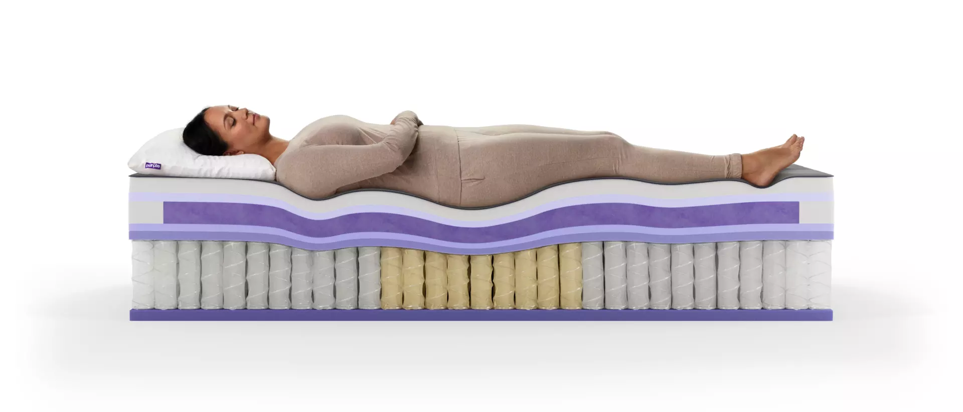 A woman sleeping on Purple RejuvenatePlus mattress