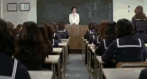 An animated gif of a scene from the film 'Terrifying Girls High School: Lynch Law Classroom' of still images showing Japanese school girls arguing, resulting in a brawl with the entire class.
