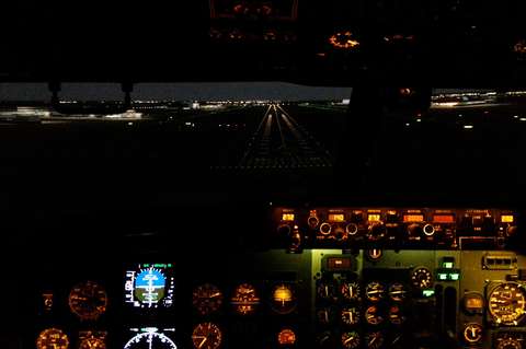 View of the approaching runway from the Boeing 737 cockpit.
