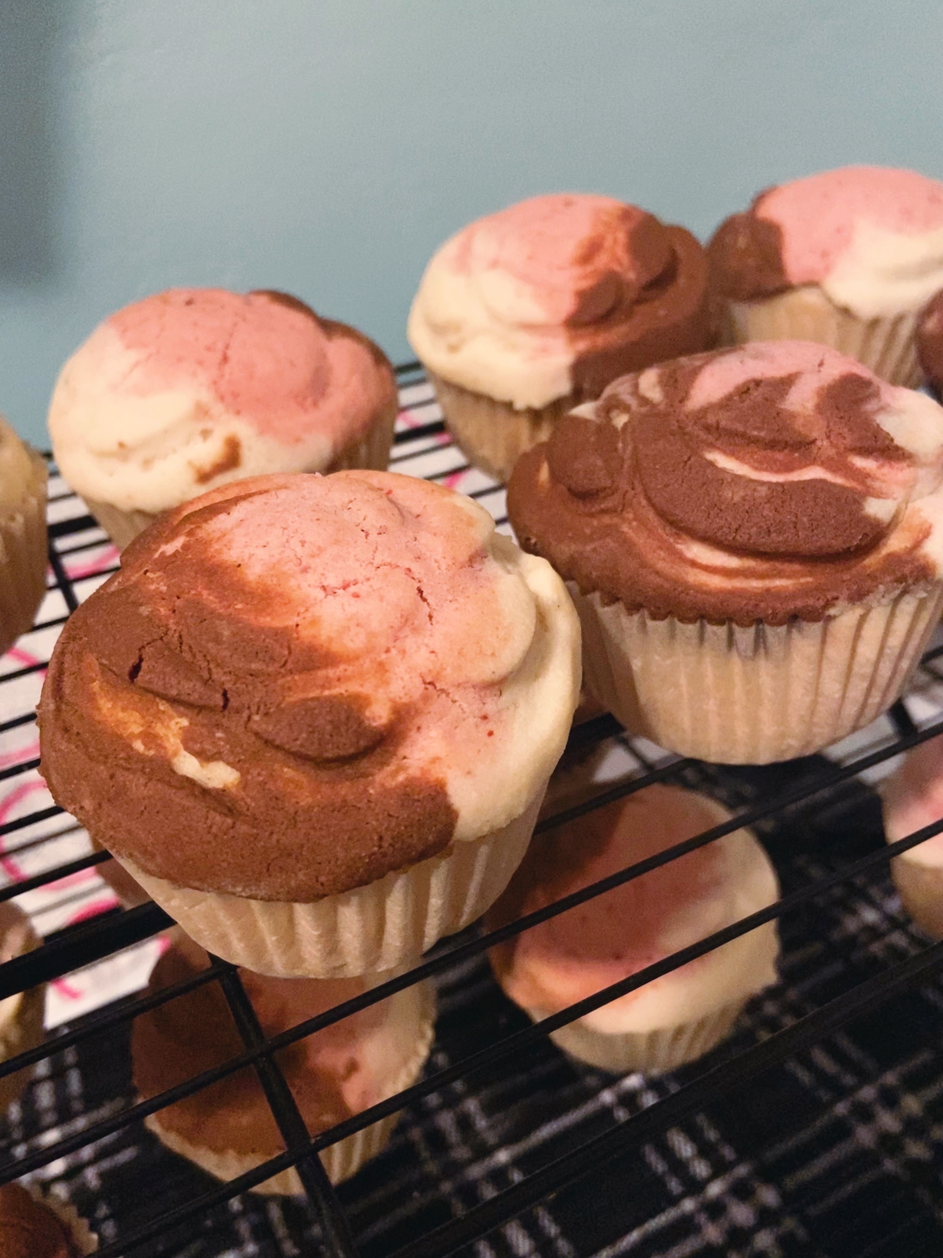 neapolitan conchas on a cooling rack