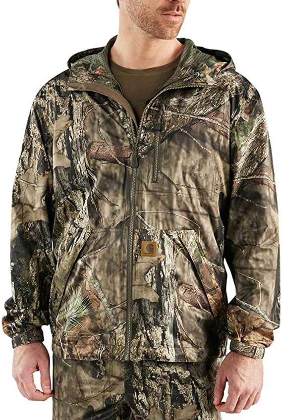 Someone wears a carhartt jacket, which is one of the best hunting jackets in 2022.