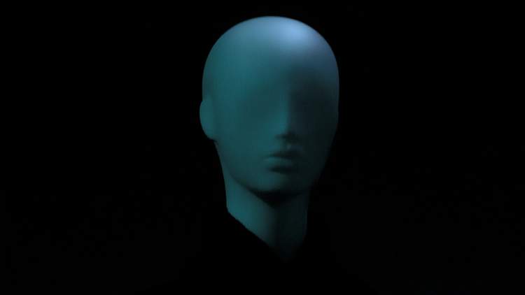 An image of a head on a black ground, representing headless CMS