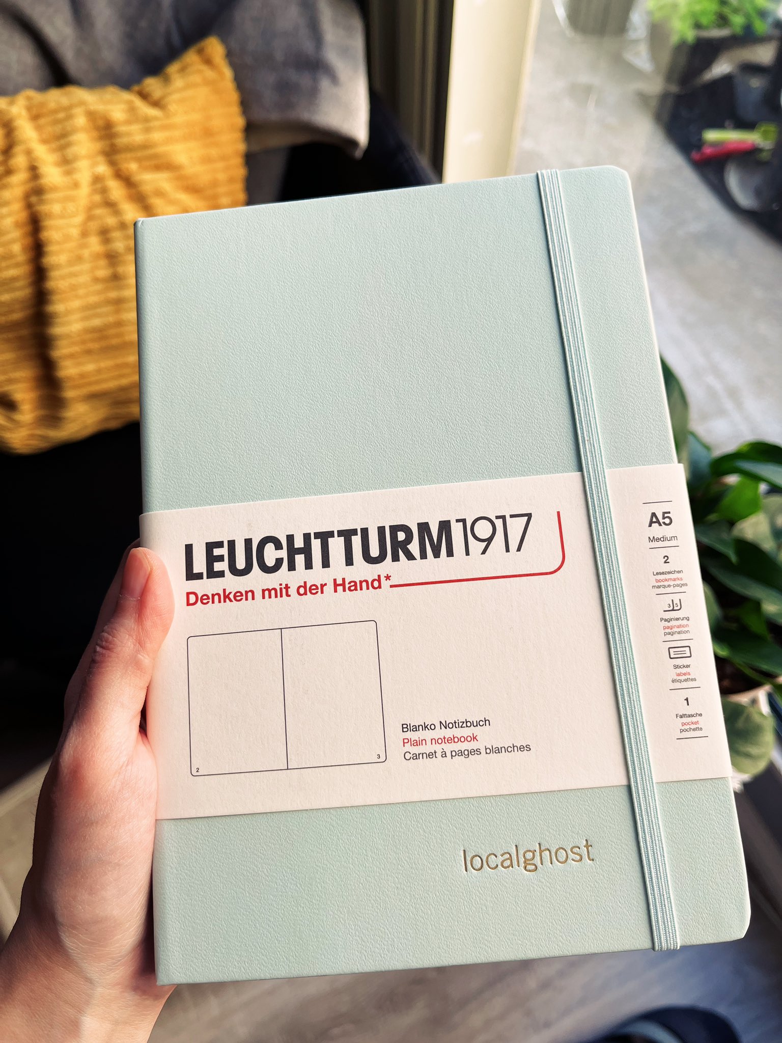 A mint coloured notebook from Leuchtturm 1917 with the word ‘localghost’ embossed on it