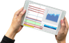 An iPad being held out showing a spreadsheet of data and
        graphs