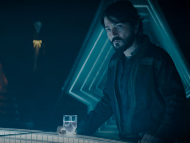 Cassian Andor taking a drink at the bar
