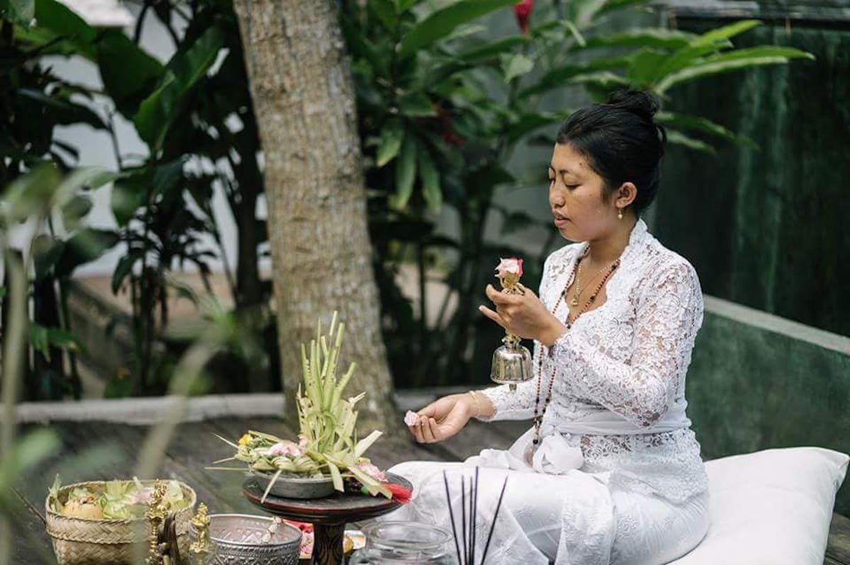 Bali priestess Tya leading ceremony with high frequency energy