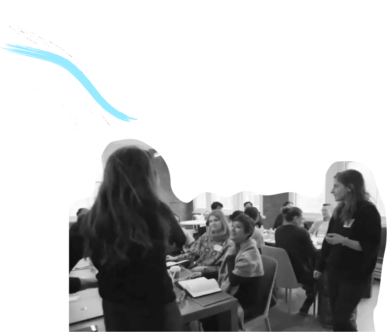 people talking to Gabi and Leah at Data Day