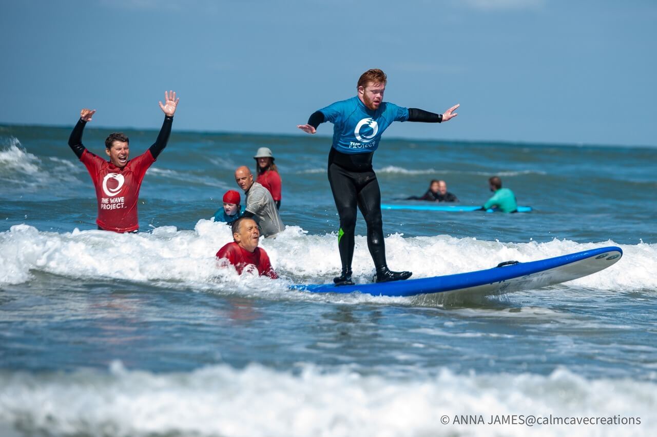 people doing adaptive surfing