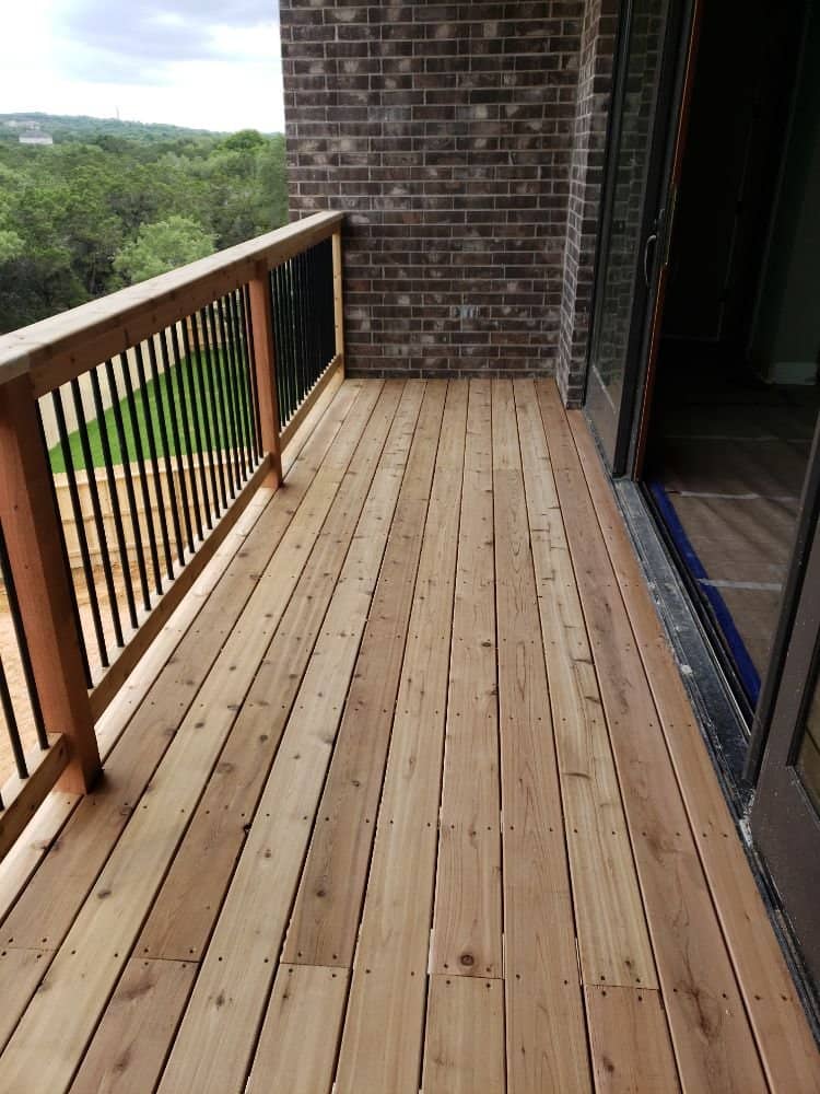 enlarged photo of woden siding home freshly stained