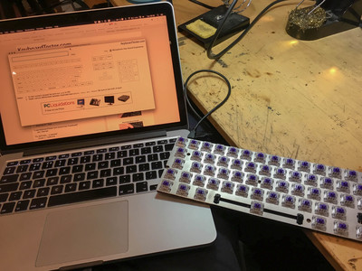 The keyboard hooked up to my laptop to test the switches.